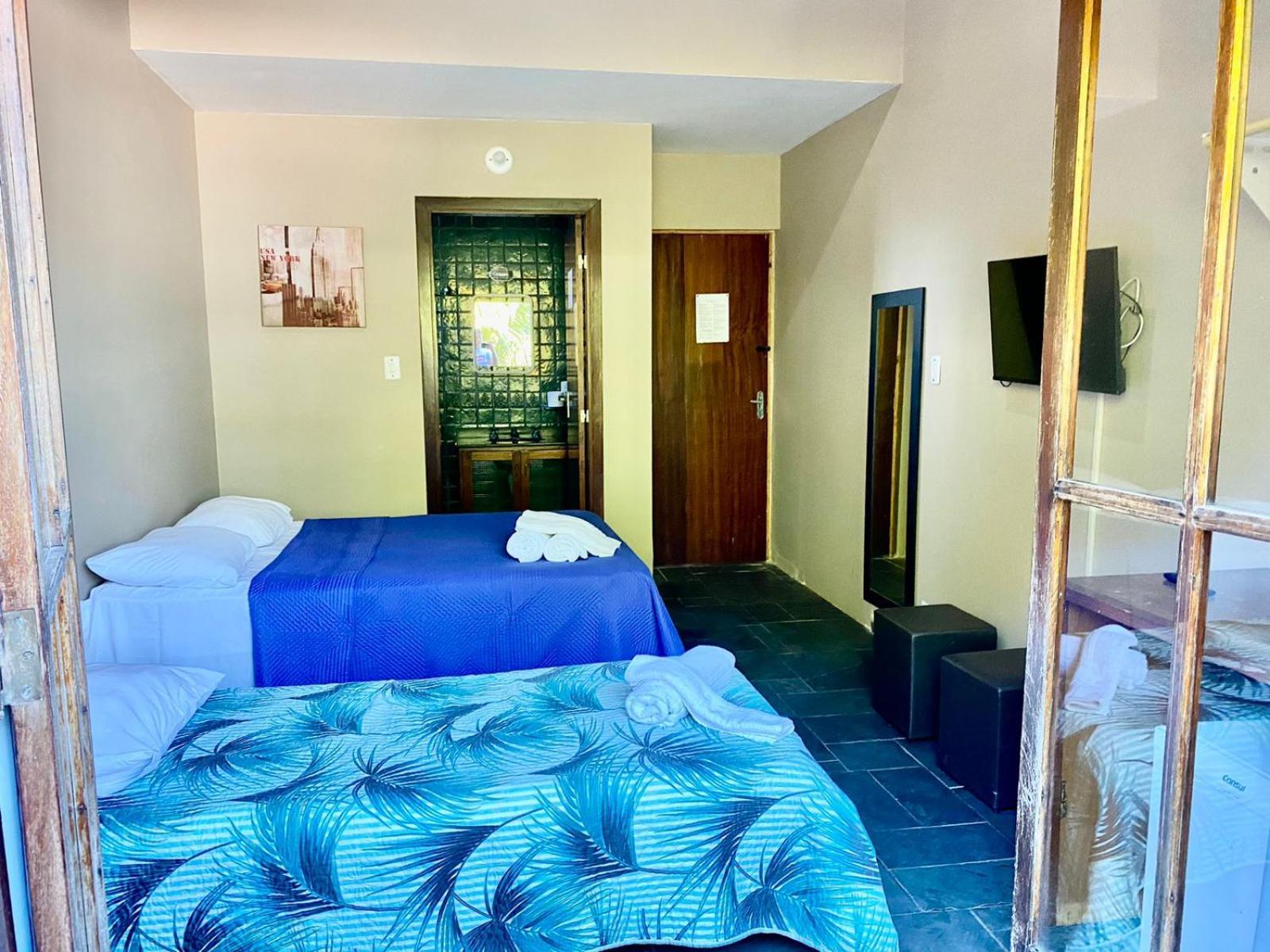 Quarto Triplo com Varanda